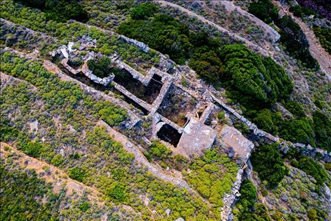 Andros ruined.  A house is becoming landmark