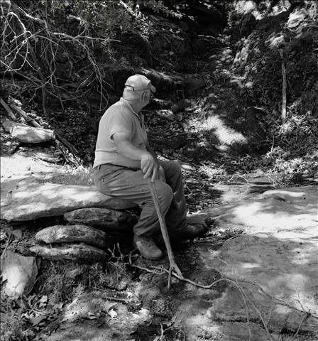 handling nature.  A man in a nature